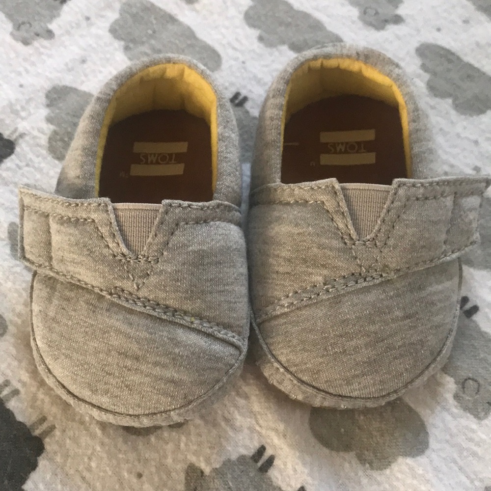 Worn once grey toms size 1